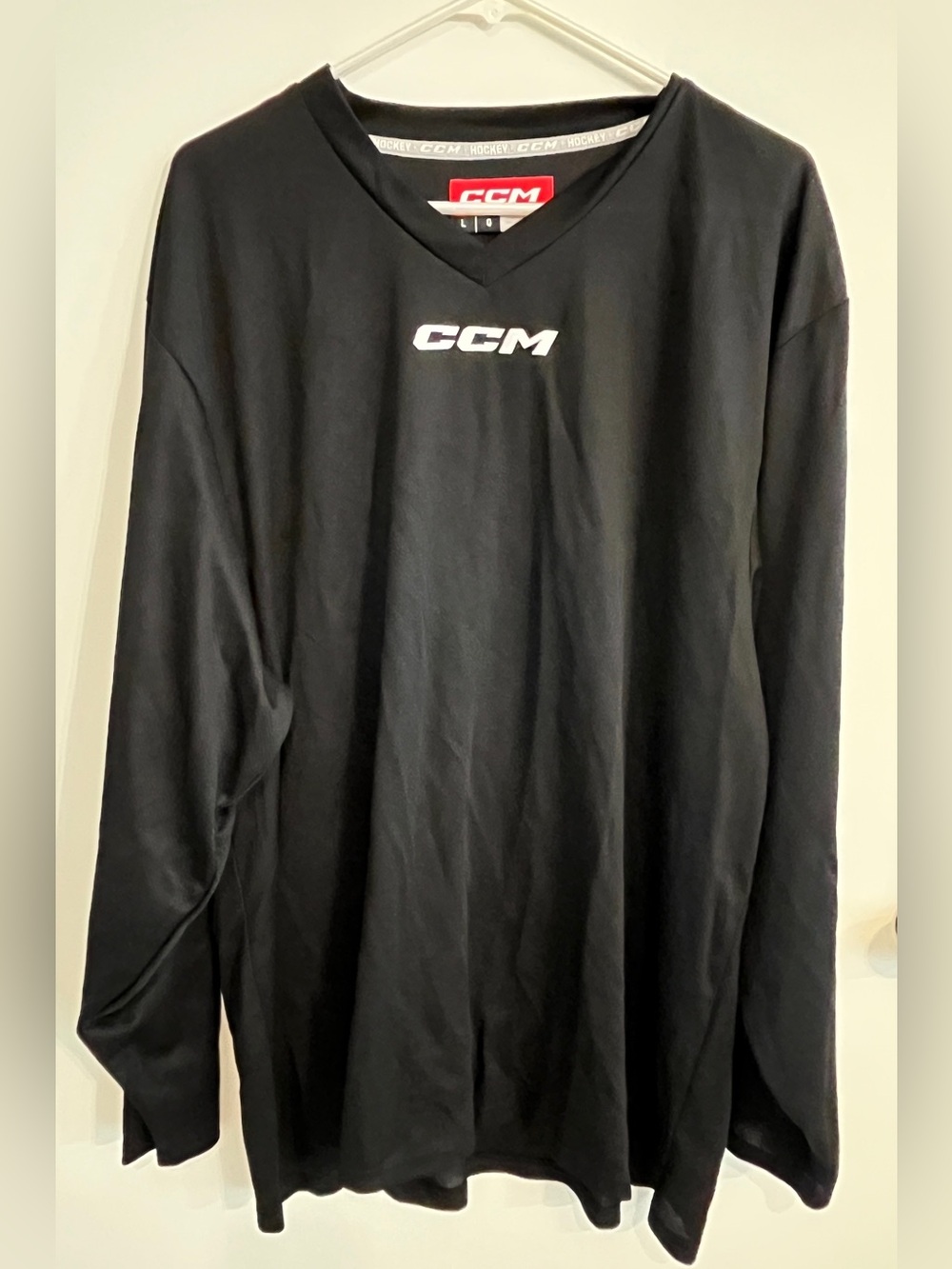 Men’s size large CCM practice warm up long sleeve jersey